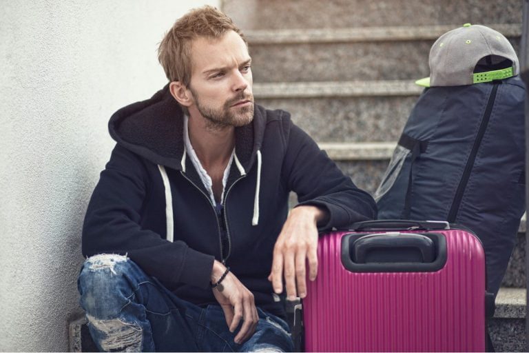 divorced man sitting on steps