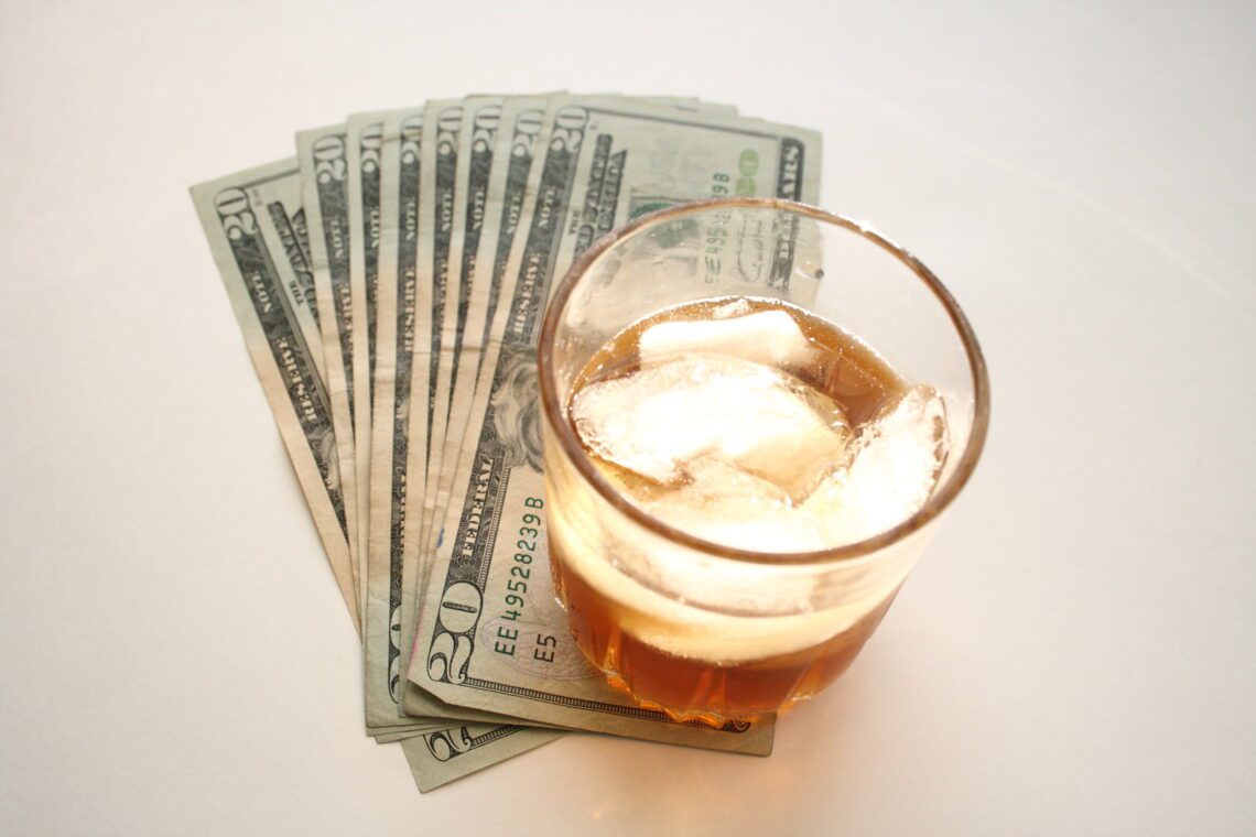 alcohol and money