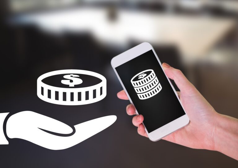 A hand holds a smartphone displaying a coin image, while a digital illustration of an open hand with a coin beside it suggests the best way to send money to Colombia.