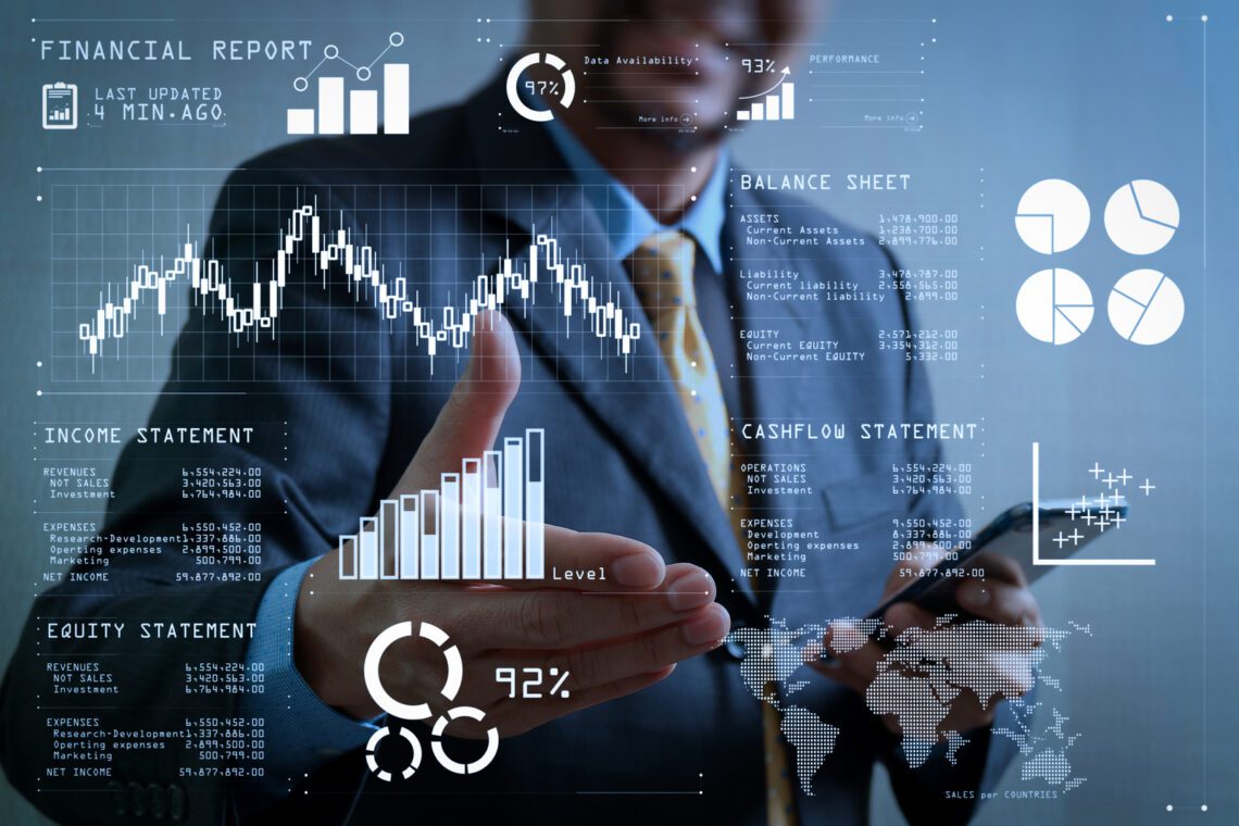 A businessperson analyzes digital financial charts with fintech marketing insights, showcasing income statements, balance sheets, cash flow, and performance metrics on a smartphone against a blurred backdrop.